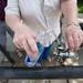 Shoppers line up to fill their water bottles at a refilling station during art fair as temperatures reach the 90s, Friday, July 19.
Courtney Sacco I AnnArbor.com 